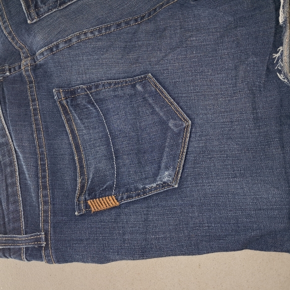 PAIGE Blue Jean Shorts with Distressed Hem - Picture 9 of 13